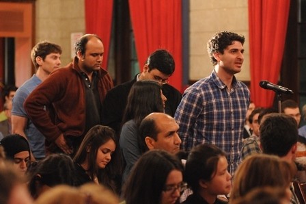 Columbia University students and community members line up to ask Ahmed Rashid a question during the question and answer session.