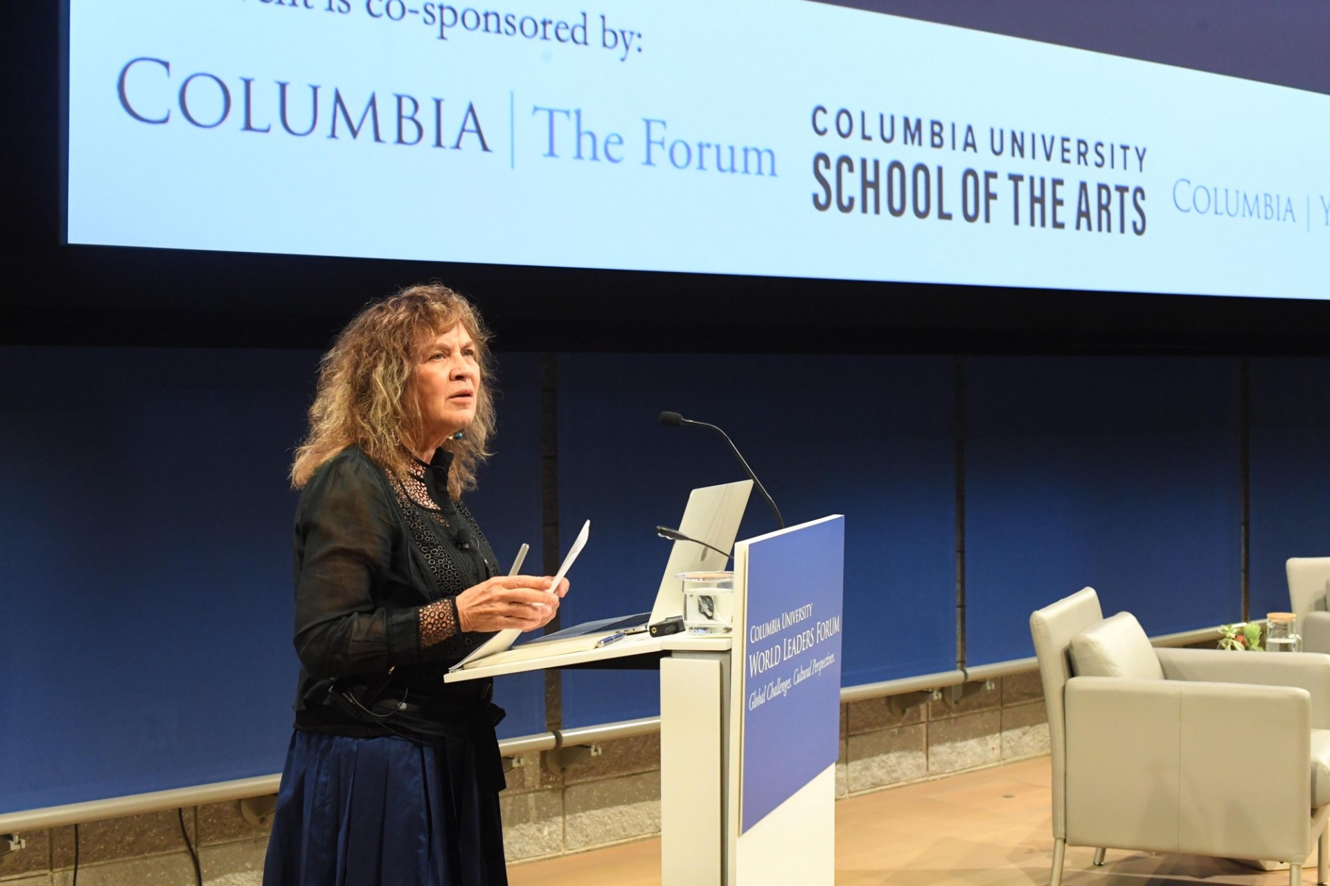 Carol Becker, Dean of Columbia University School of the Arts begins the World Leaders Forum with an introduction of Olafur Eliasson, Multimedia Artist.