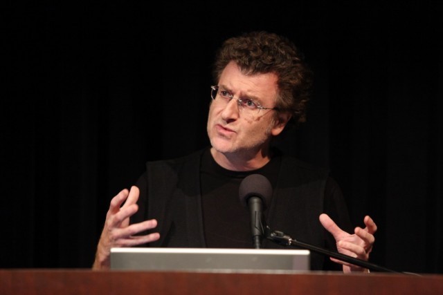 Artist, Alfredo Jaar, presents to the audience in Miller Theatre on October 1, 2009.